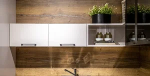 Natural wood kitchen cabinets with white uppers and open shelving