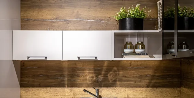Natural wood kitchen cabinets with white uppers and open shelving